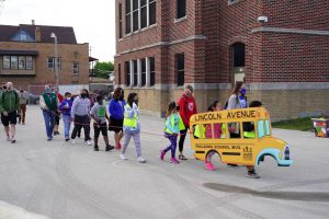 Students participate in walking school bus.